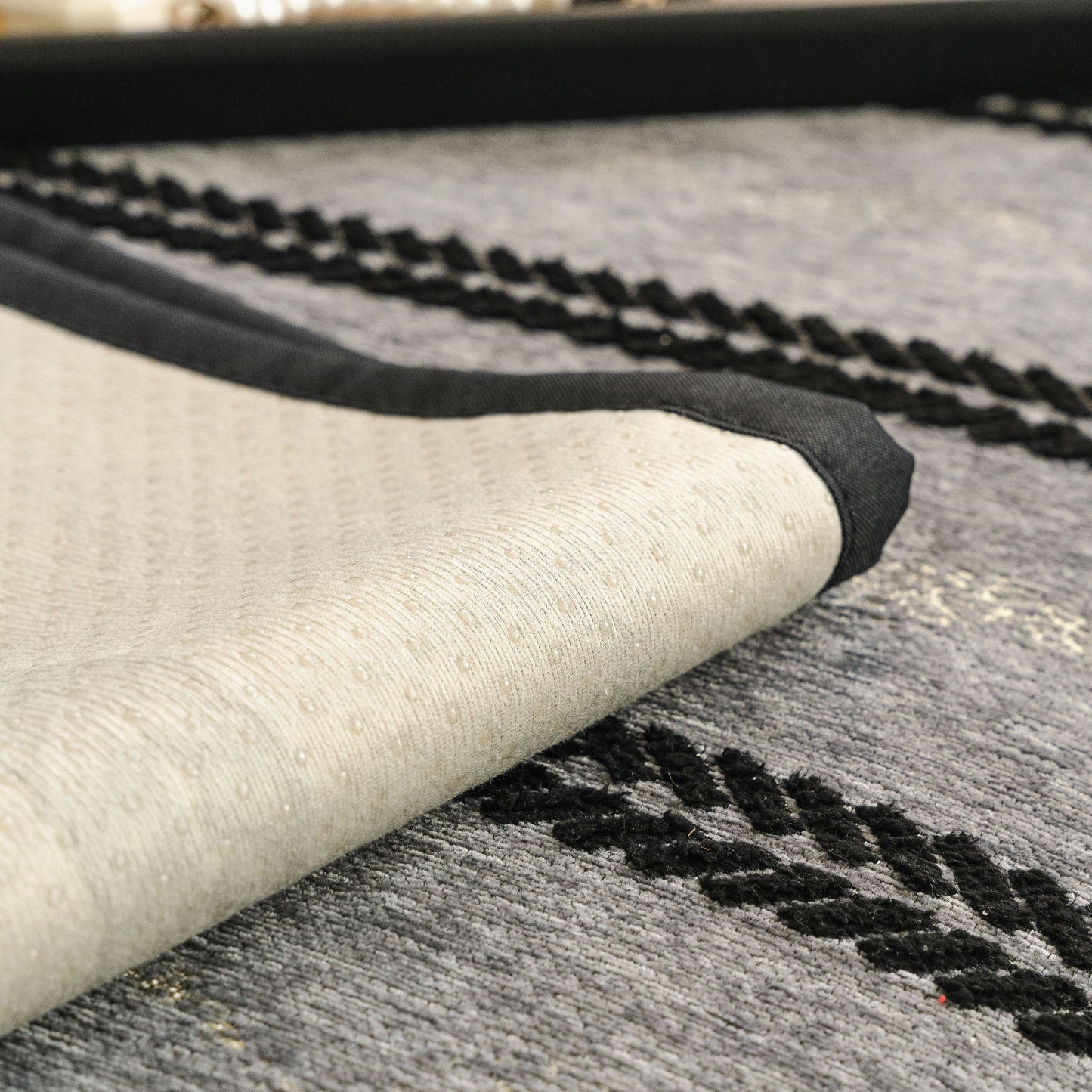 Non-Slip Sofa Cover with Thick Chenille Texture Woven Stripe Couch Protector Throw showing silicone anti-slip backing.