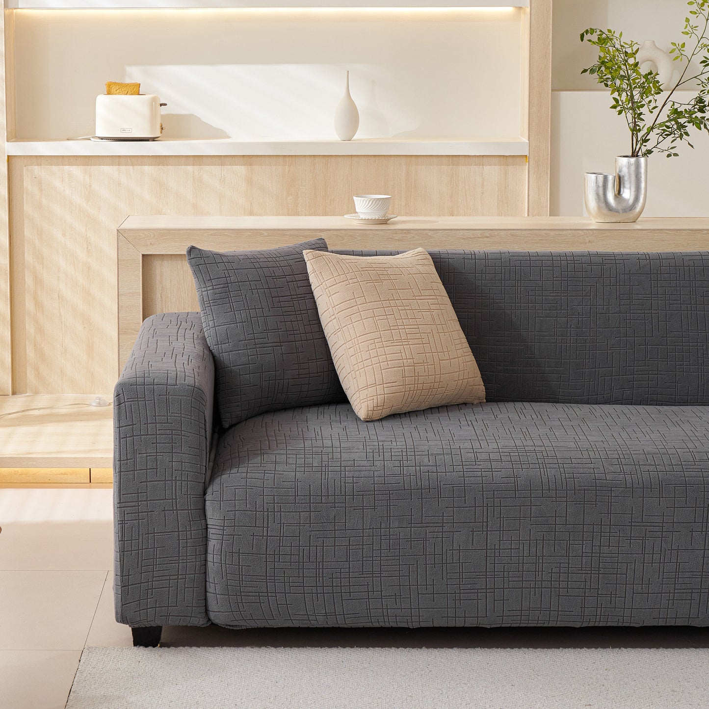 Elegant living room with Embossed Lines Couch Covers Stretchable Non-Slip & Washable Sofa Slipcovers in grey and beige.