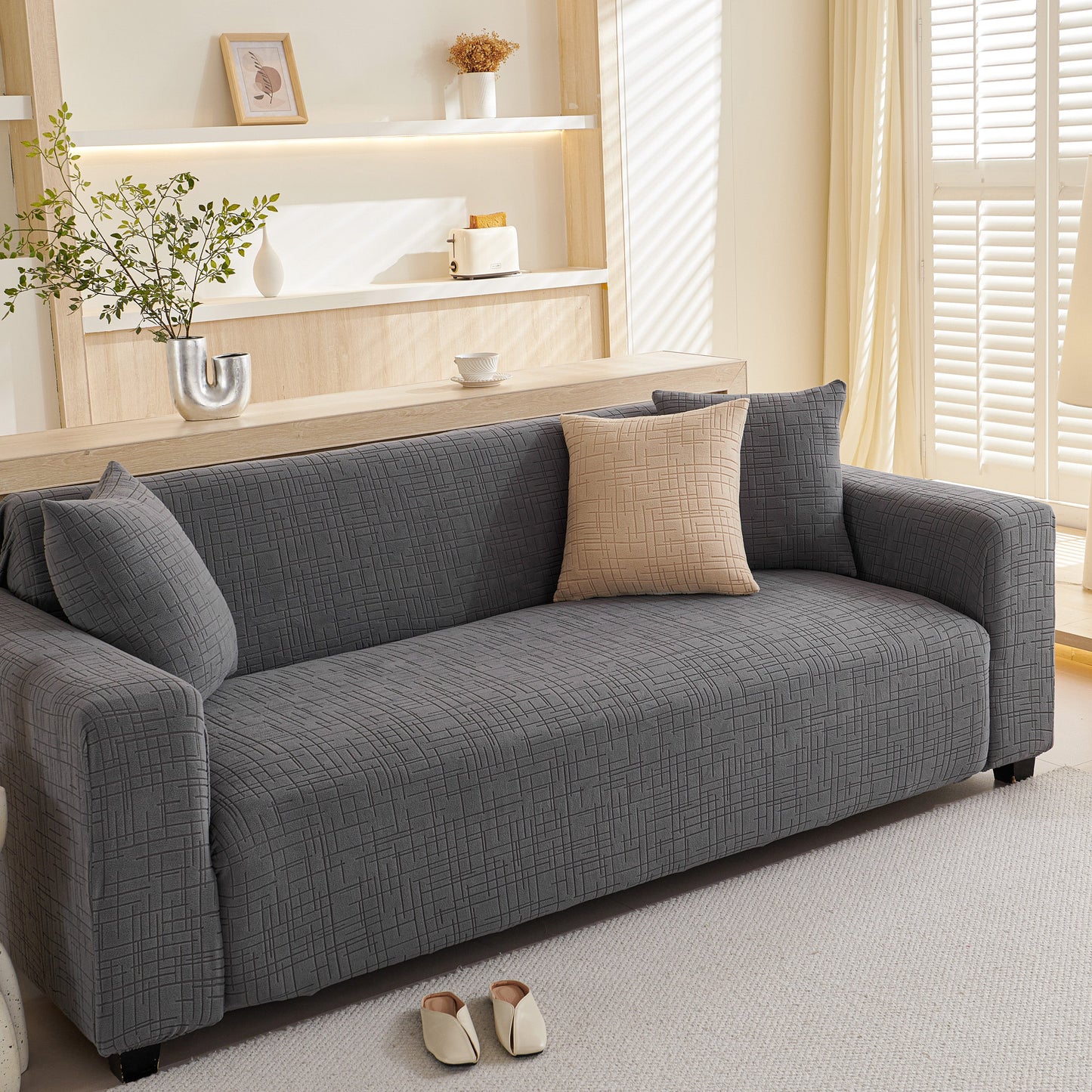 Embossed Lines Couch Covers Stretchable Non-Slip & Washable Sofa Slipcovers on a modern living room couch