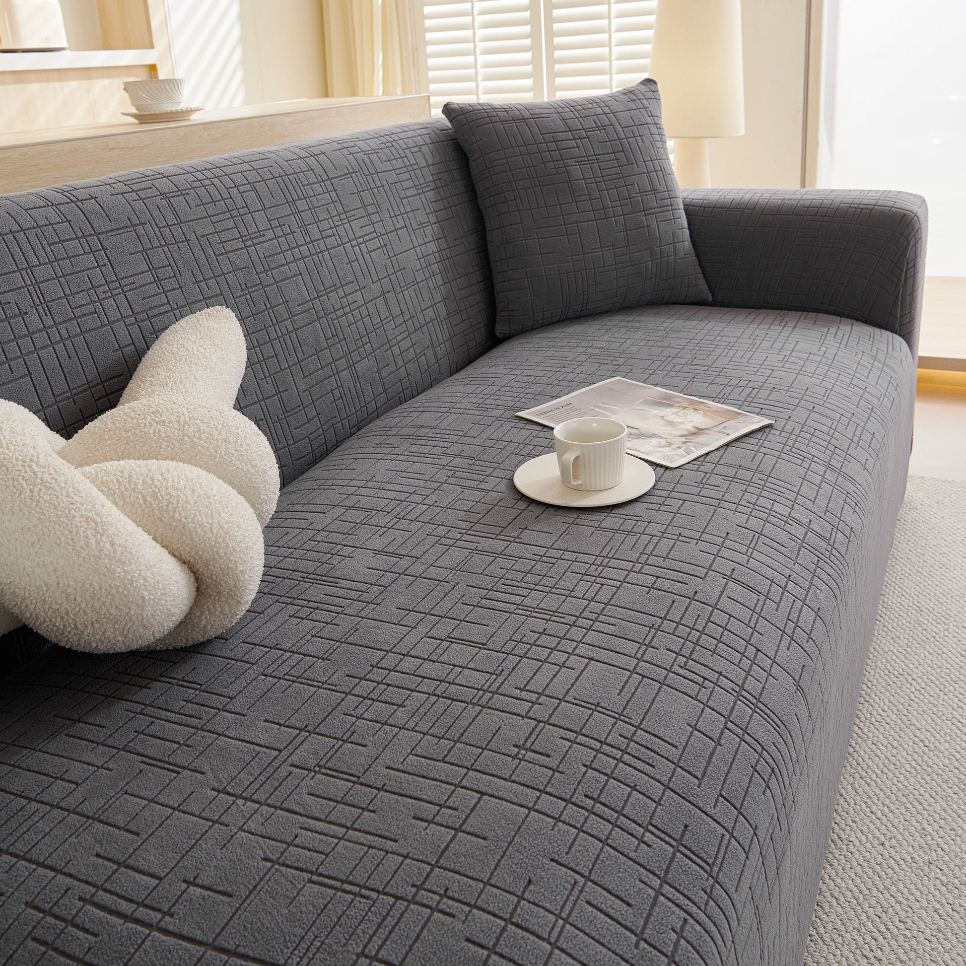 Embossed Lines Couch Covers Stretchable Non-Slip & Washable Sofa Slipcovers in modern living room setting.