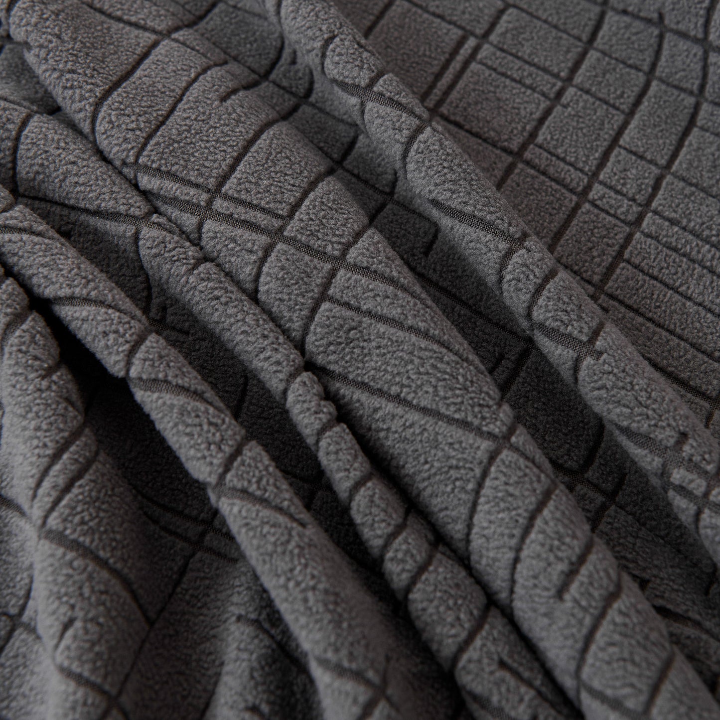 Close-up of Embossed Lines Couch Covers Stretchable Non-Slip & Washable Sofa Slipcovers fabric texture in gray.