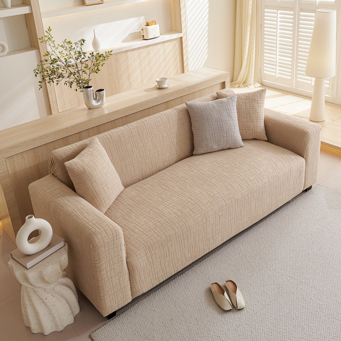 Living room with sofa covered by Embossed Lines Couch Covers Stretchable Non-Slip & Washable Sofa Slipcovers