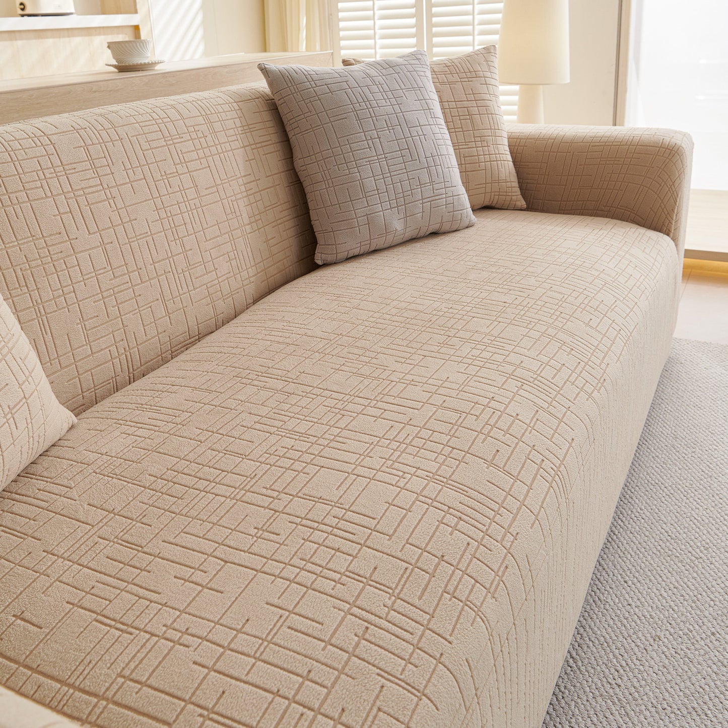 Embossed Lines Couch Covers Stretchable Non-Slip & Washable Sofa Slipcovers on beige sofa