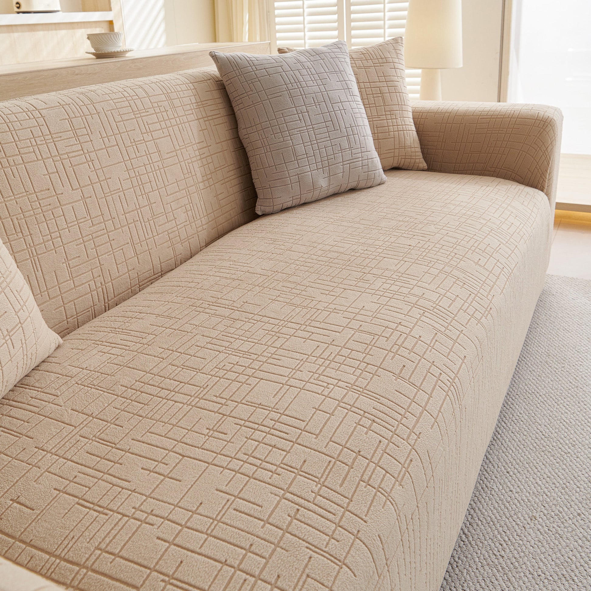 Embossed Lines Couch Covers Stretchable Non-Slip & Washable Sofa Slipcovers on beige sofa
