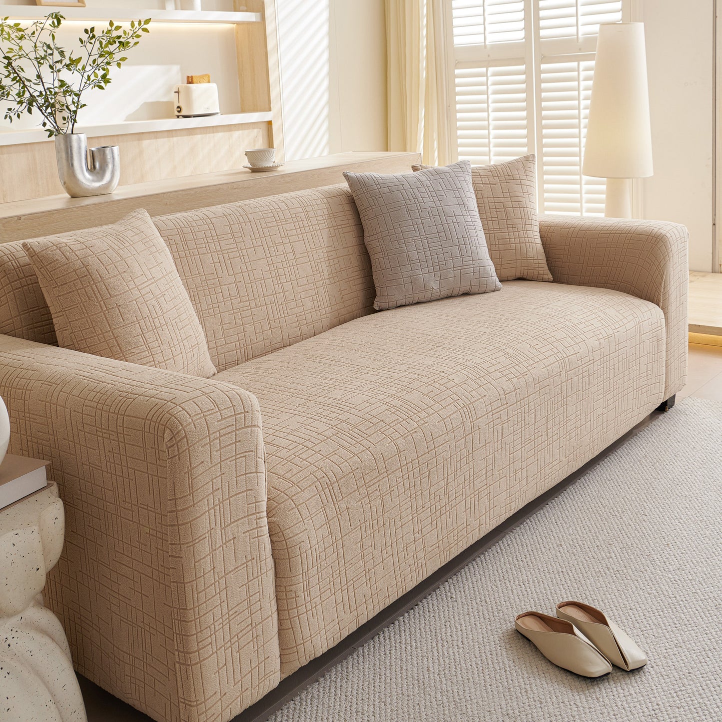 Embossed Lines Couch Covers Stretchable Non-Slip & Washable Sofa Slipcovers enhancing a modern living room decor.