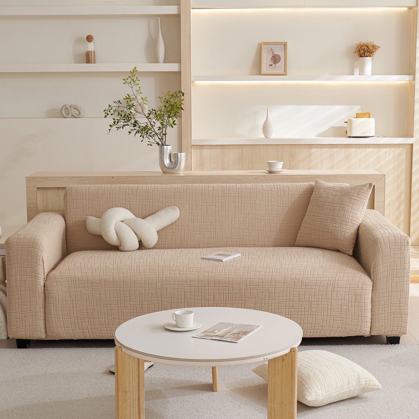 Embossed Lines Couch Covers Stretchable Non-Slip & Washable Sofa Slipcovers on a beige couch in a modern living room