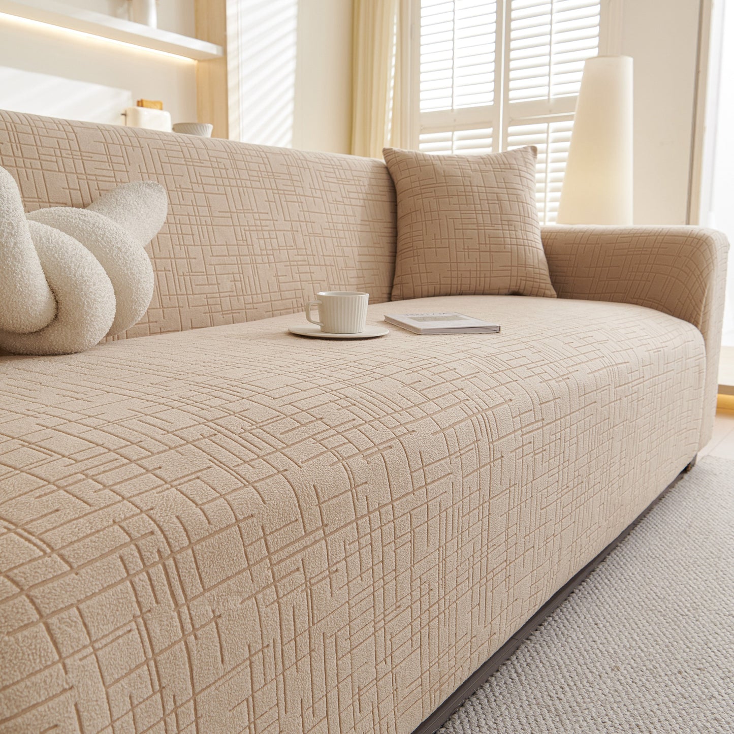 Embossed Lines Couch Covers Stretchable Non-Slip & Washable Sofa Slipcovers on beige couch in modern living room setting