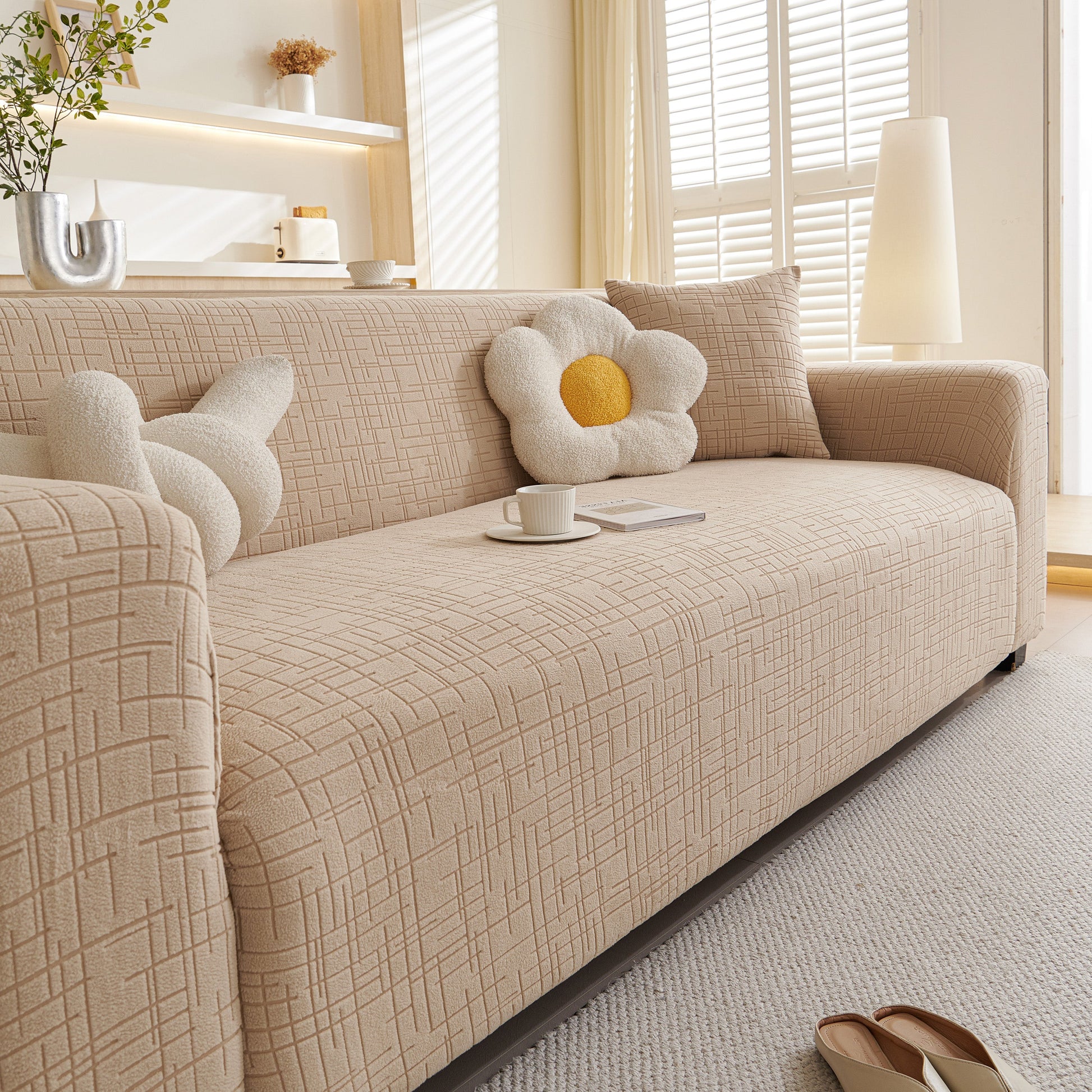 Embossed Lines Couch Covers Stretchable Non-Slip & Washable Sofa Slipcovers on stylish living room sofa with decorative pillows