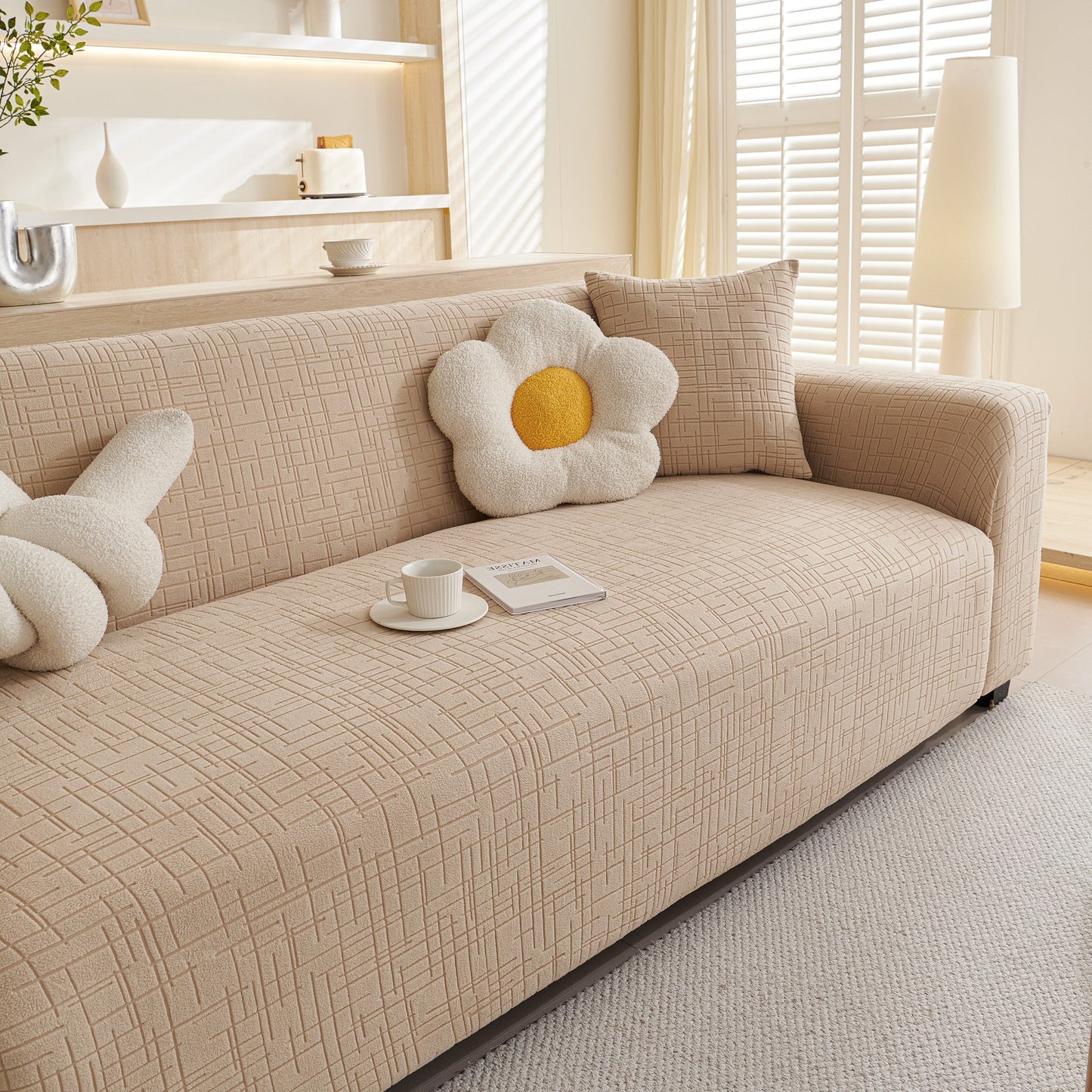 Embossed Lines Couch Covers Stretchable Non-Slip & Washable Sofa Slipcovers on beige sofa in living room setting