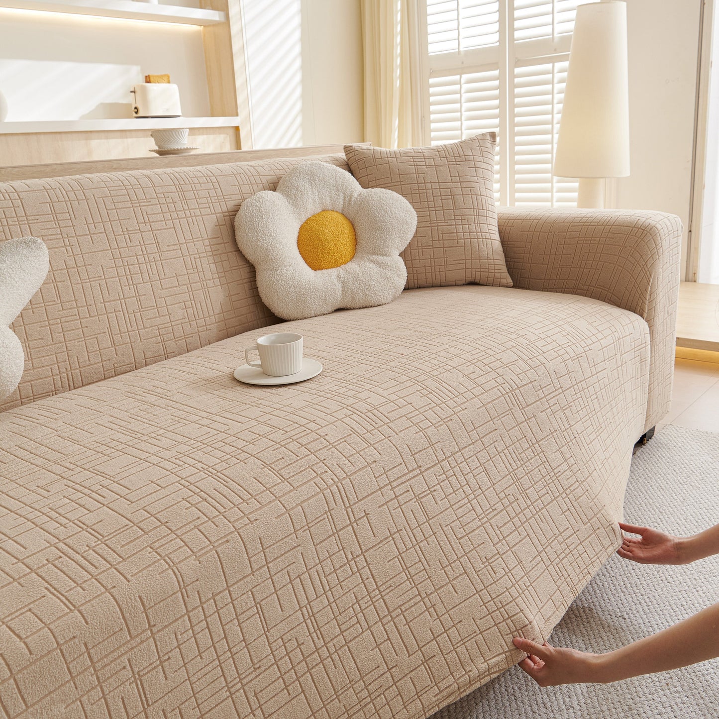 Embossed Lines Couch Covers Stretchable Non-Slip & Washable Sofa Slipcovers in a cozy living room setting with a floral pillow.