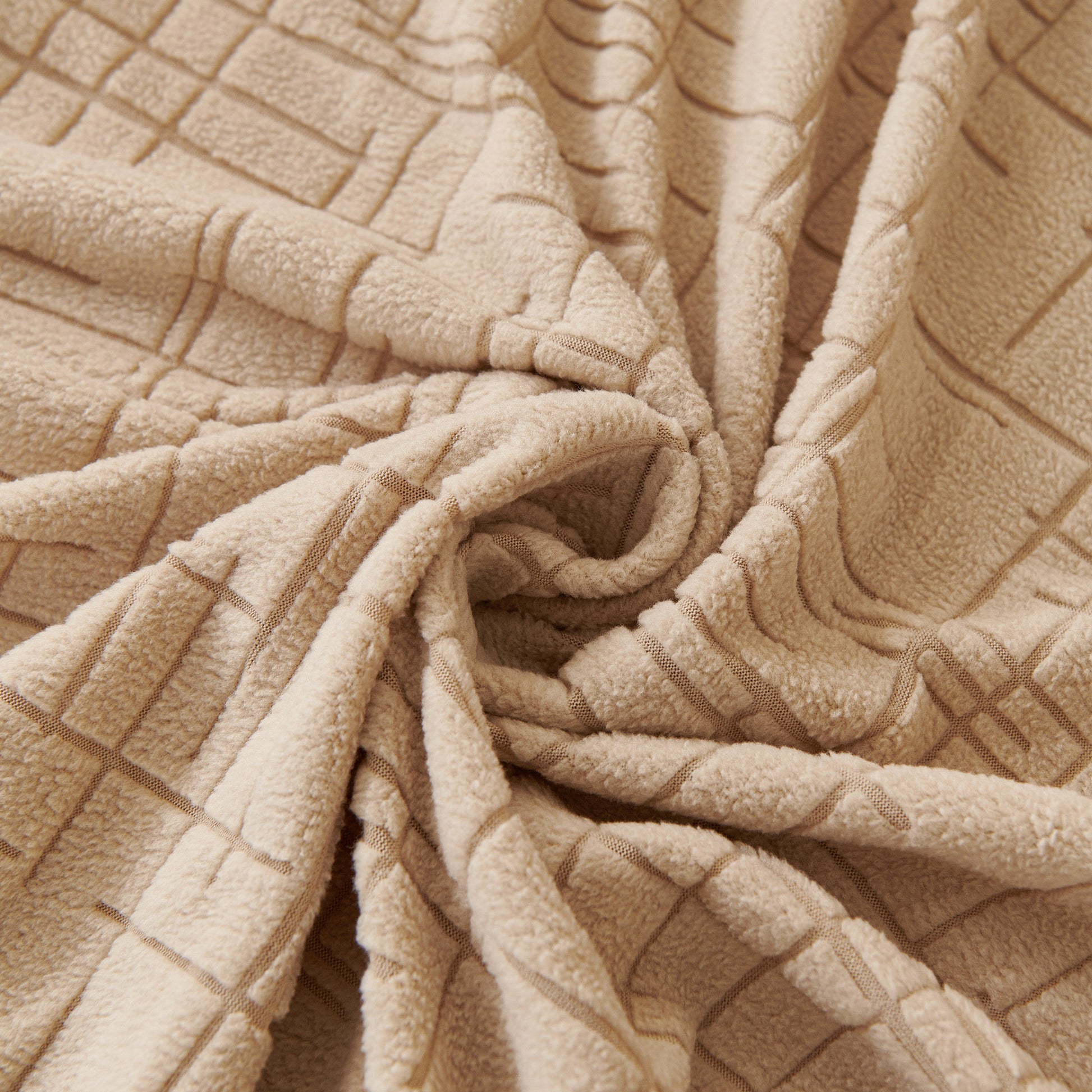 Embossed Lines Couch Covers Stretchable Non-Slip & Washable Sofa Slipcovers close-up of fabric texture in beige.