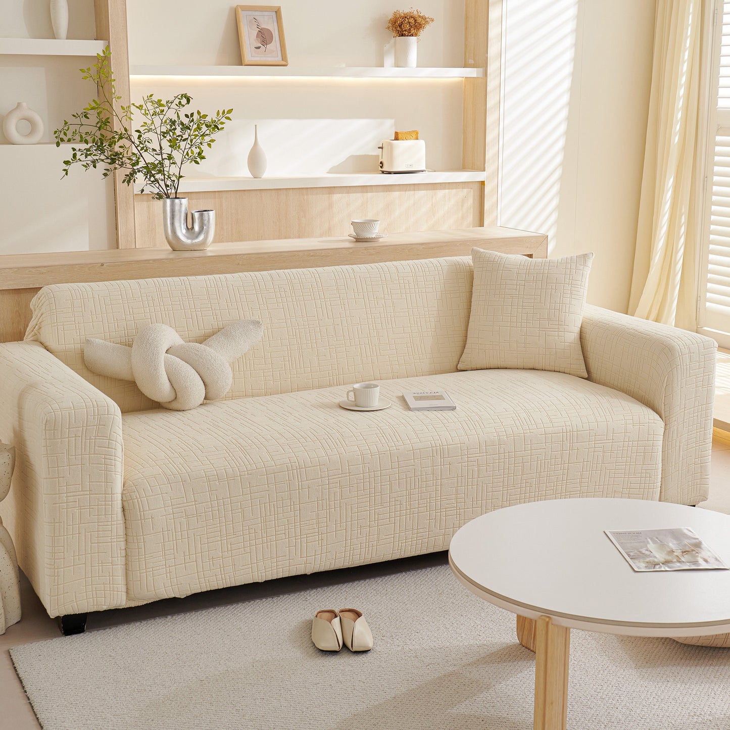 Embossed Lines Couch Covers Stretchable Non-Slip & Washable Sofa Slipcovers on a modern beige sofa.