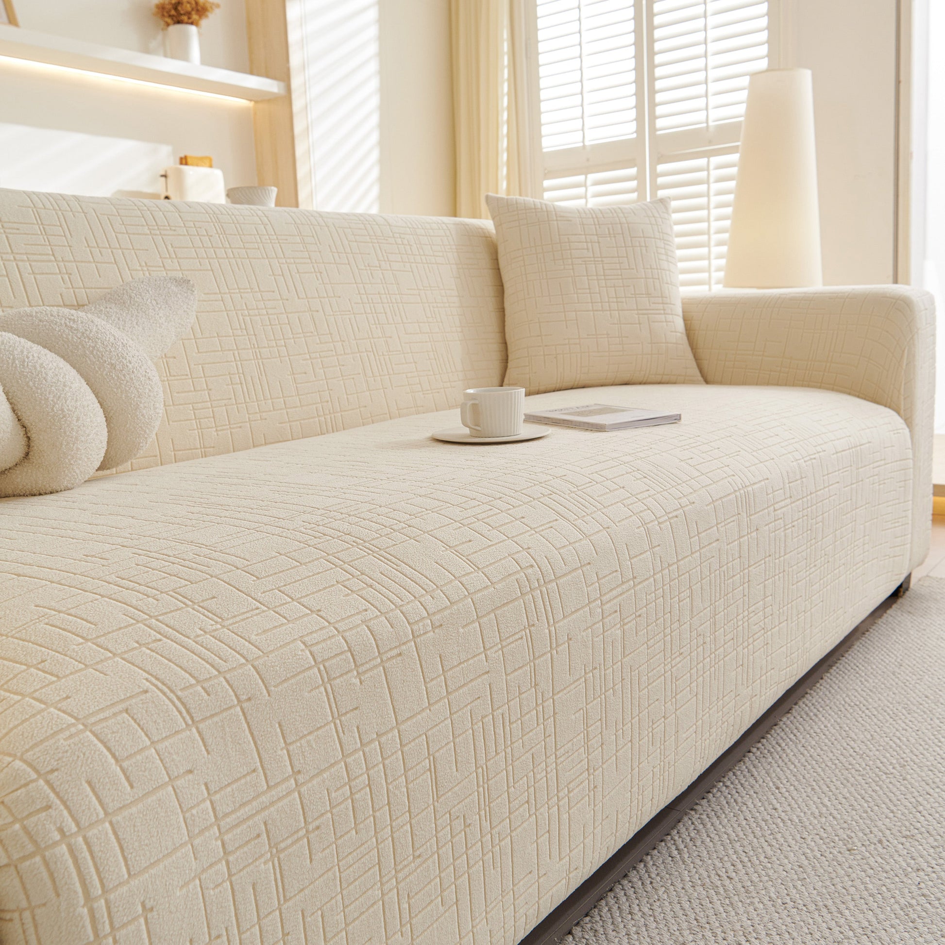 Embossed Lines Couch Covers Stretchable Non-Slip & Washable Sofa Slipcovers on beige sofa with decorative pillows