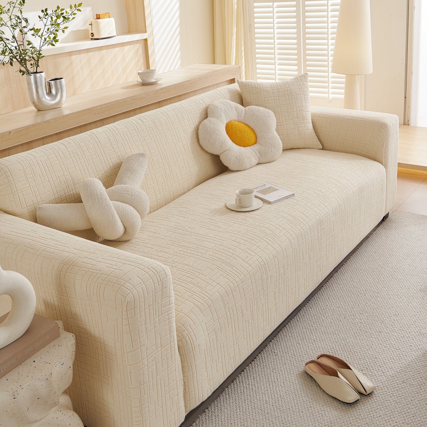 Embossed Lines Couch Covers Stretchable Non-Slip & Washable Sofa Slipcovers on a modern beige couch
