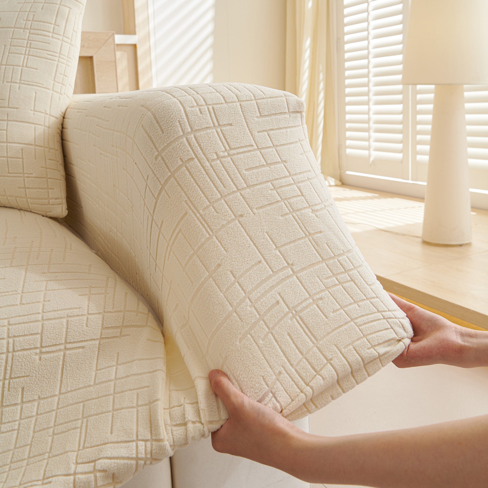 Person fitting Embossed Lines Couch Covers Stretchable Non-Slip & Washable Sofa Slipcovers on sofa arm