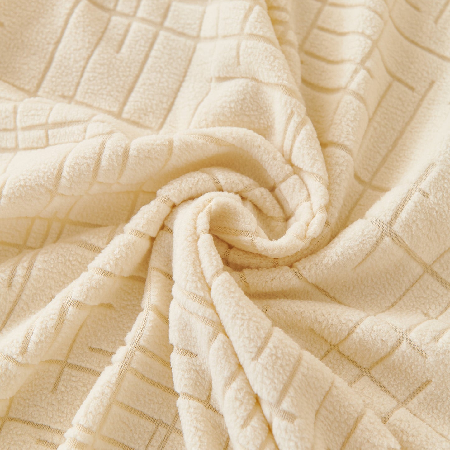 Embossed Lines Couch Covers Stretchable Non-Slip & Washable Sofa Slipcovers in beige fabric with embossed design.