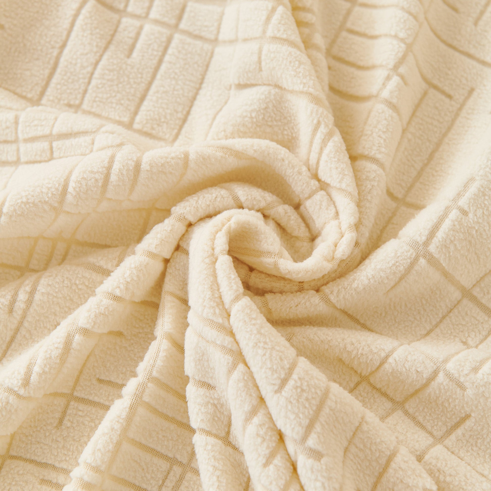 Embossed Lines Couch Covers Stretchable Non-Slip & Washable Sofa Slipcovers in beige fabric with embossed design.