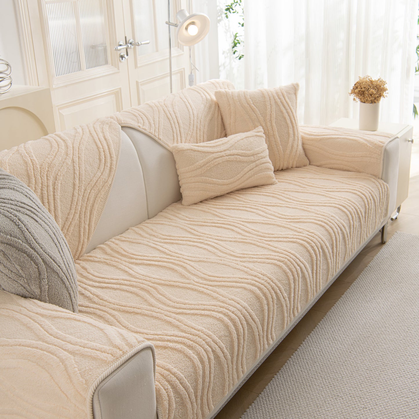 Winter Thickened Non-slip Blanket, Three-Dimensional Embossed Cotton Velvet Sofa Cover on a beige sofa