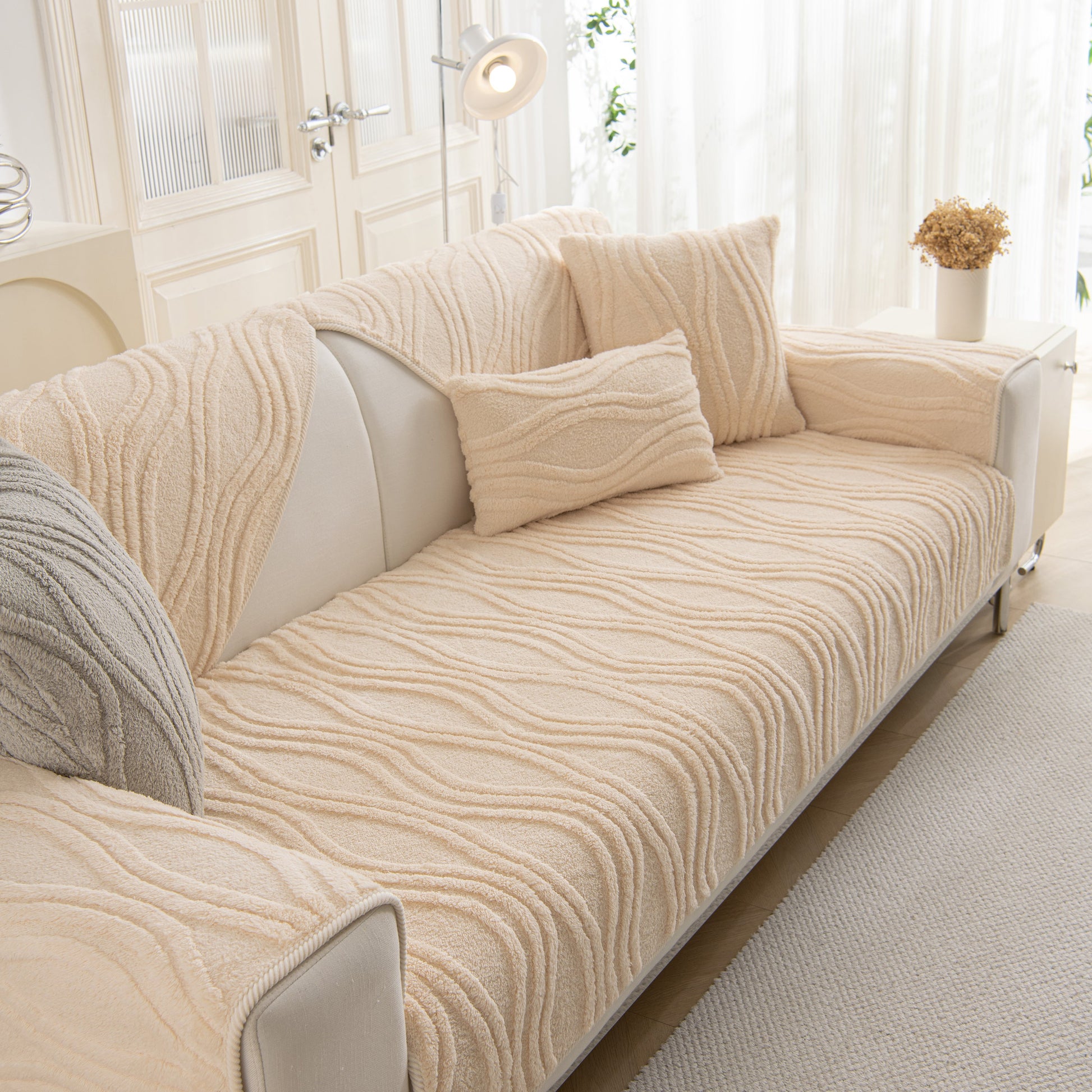 Winter Thickened Non-slip Blanket, Three-Dimensional Embossed Cotton Velvet Sofa Cover on a beige sofa
