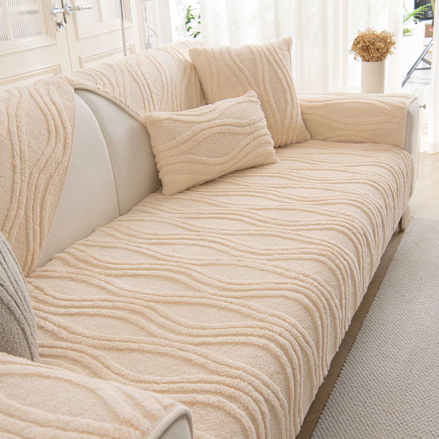 Winter Thickened Non-slip Blanket, Three-Dimensional Embossed Cotton Velvet Sofa Cover adding warmth to a living room.