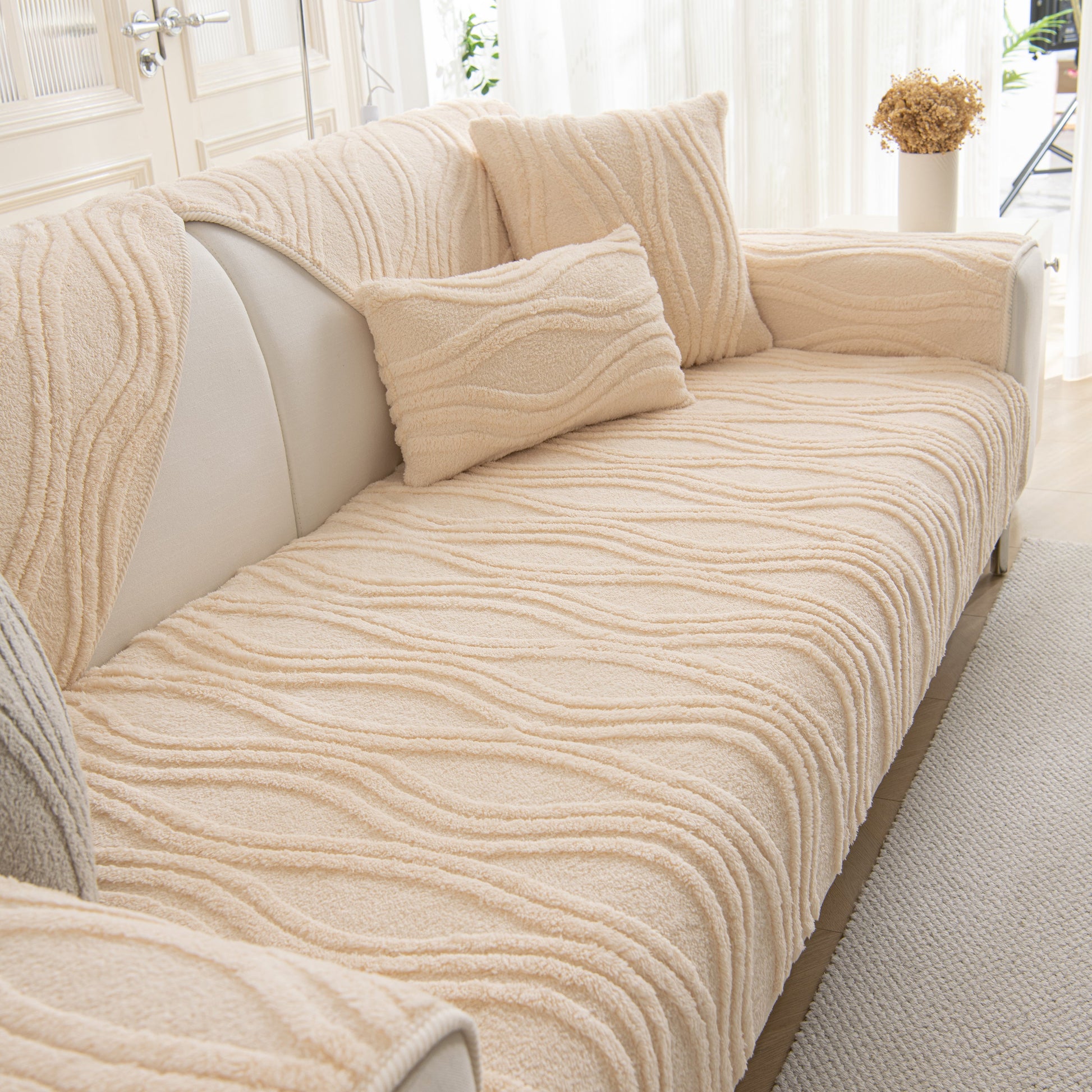 Winter Thickened Non-slip Blanket, Three-Dimensional Embossed Cotton Velvet Sofa Cover adding warmth to a living room.