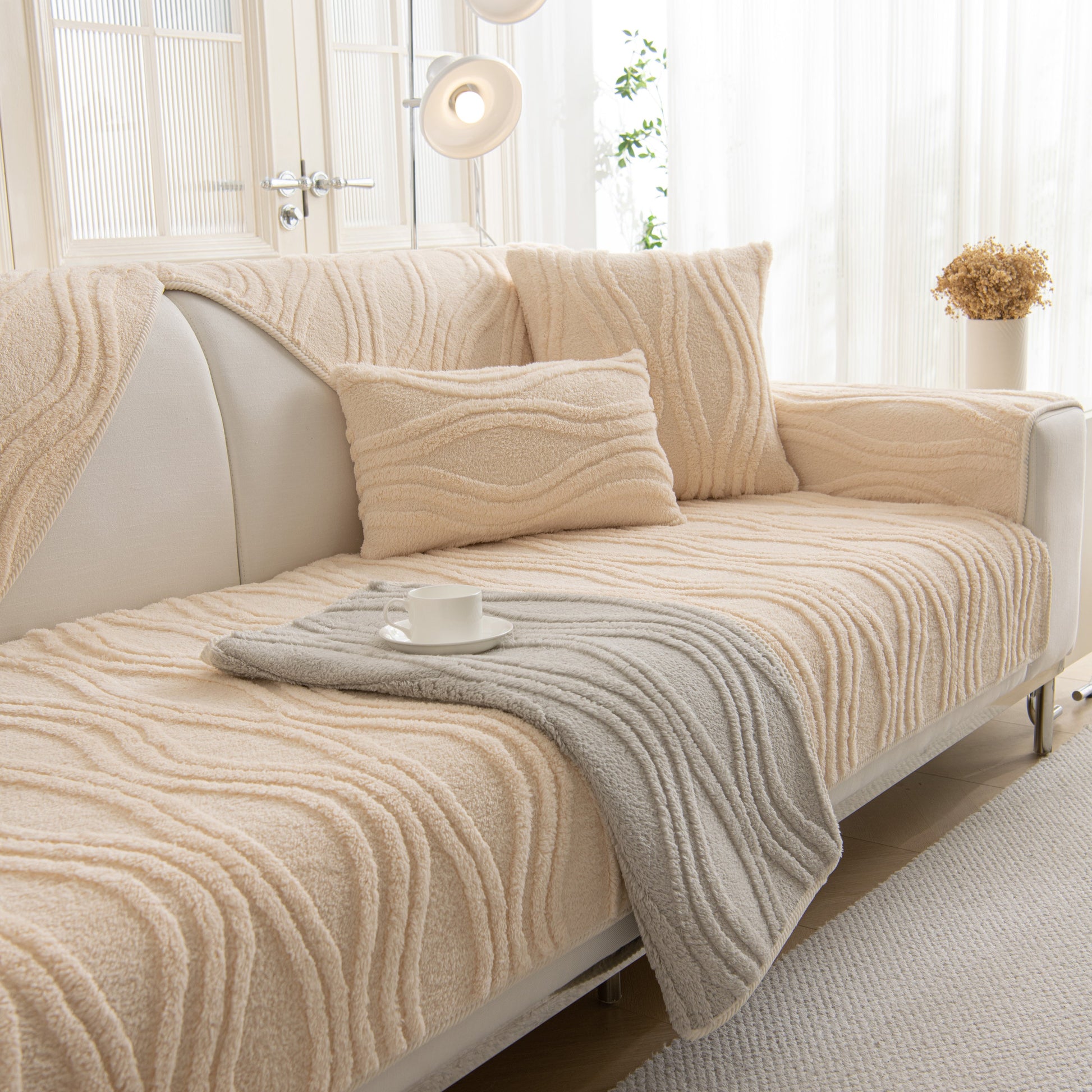 Winter Thickened Non-slip Blanket, Three-Dimensional Embossed Cotton Velvet Sofa Cover on a modern couch.