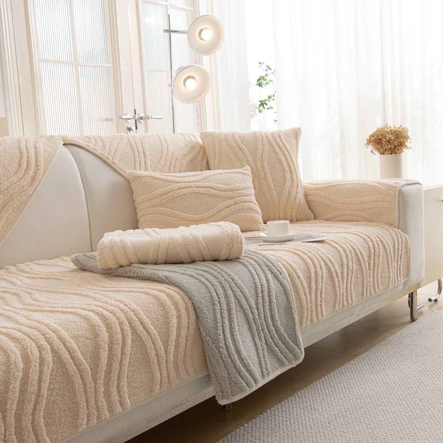 Winter Thickened Non-slip Blanket, Three-Dimensional Embossed Cotton Velvet Sofa Cover draped over sofa with decor cushions.