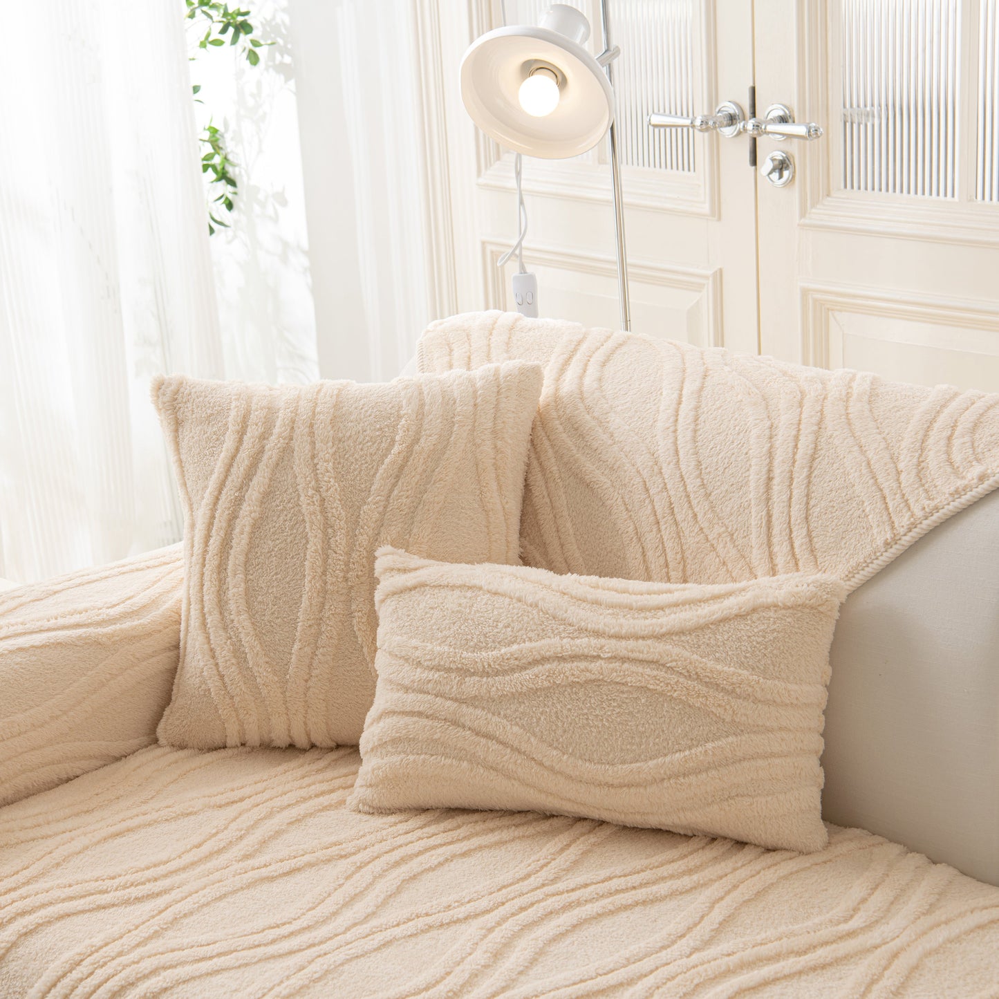 Winter Thickened Non-slip Blanket, Three-Dimensional Embossed Cotton Velvet Sofa Cover on beige sofa with textured pillows.