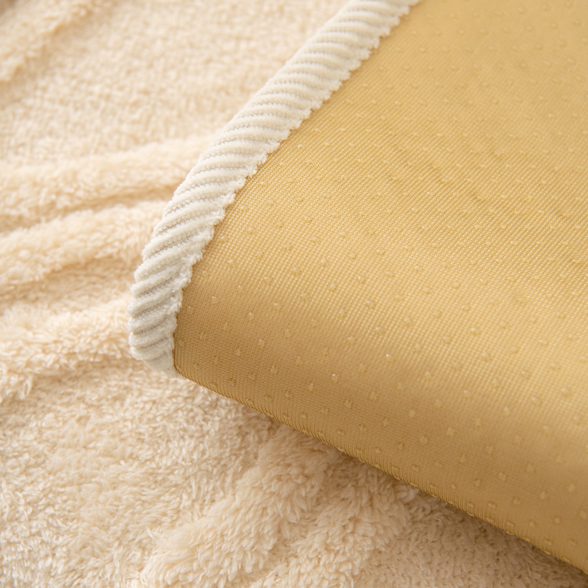 Winter Thickened Non-slip Blanket, Three-Dimensional Embossed Cotton Velvet Sofa Cover in soft yellow hue with textured design.