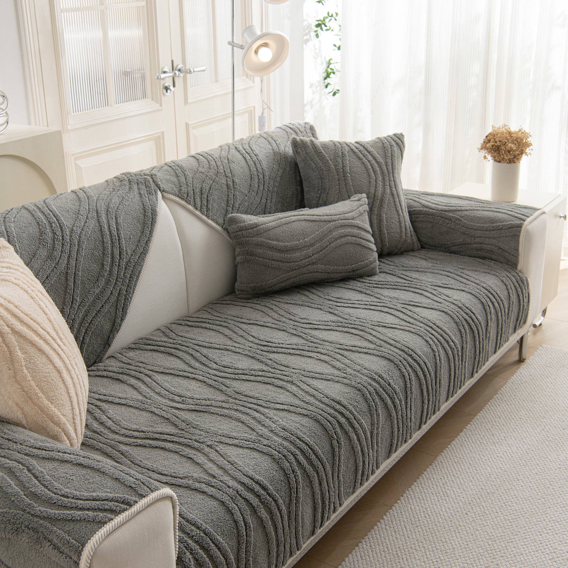 Winter Thickened Non-slip Blanket, Three-Dimensional Embossed Cotton Velvet Sofa Cover on gray sofa.