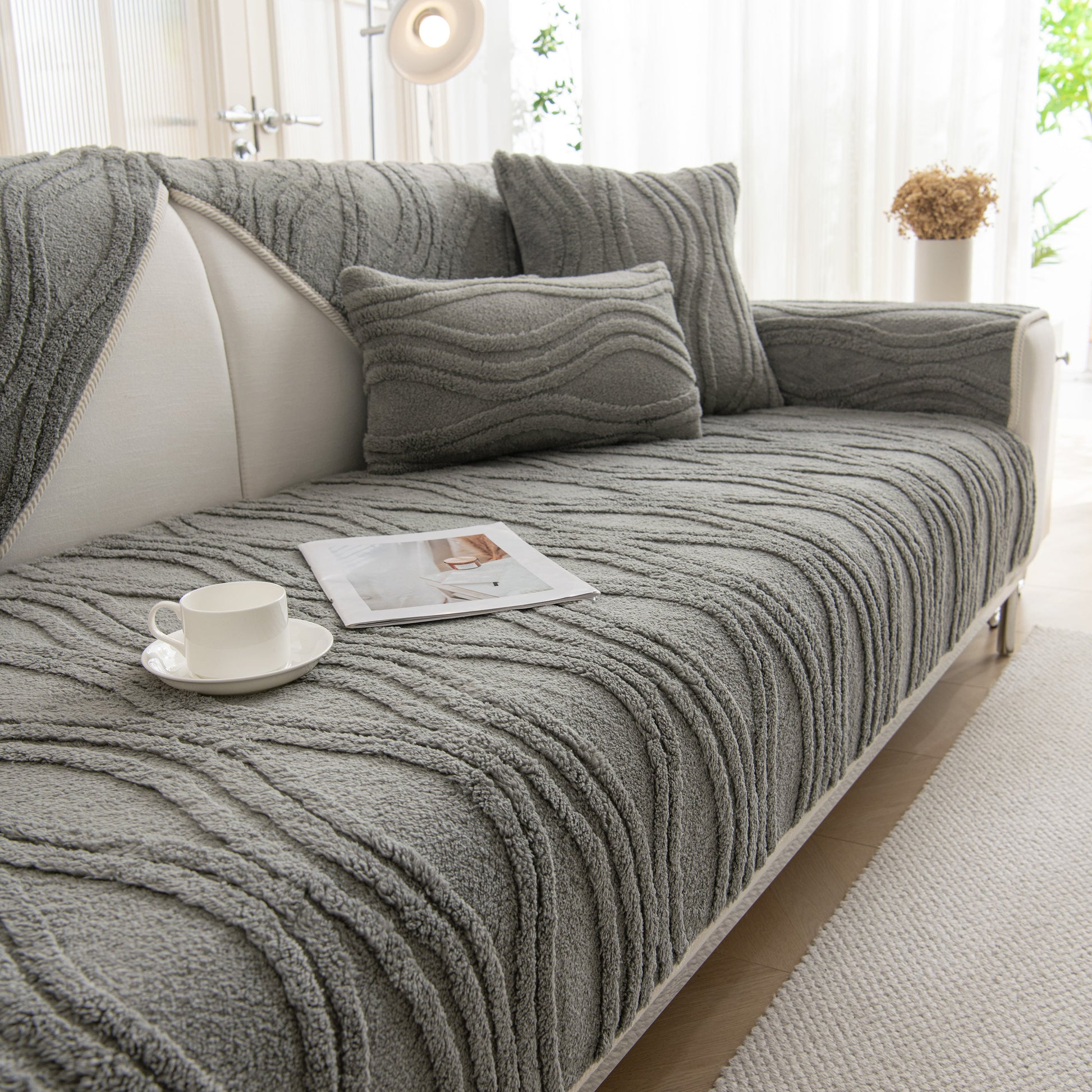 Winter Thickened Non-slip Blanket, Three-Dimensional Embossed Cotton Velvet Sofa Cover on a stylish couch in a cozy living room