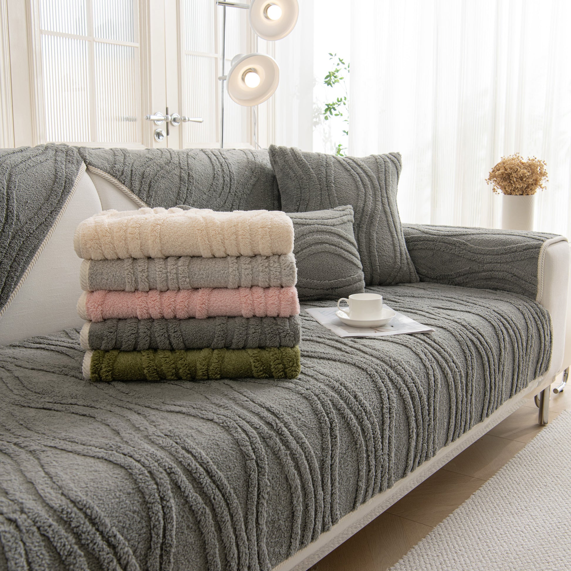 Winter Thickened Non-slip Blanket, Three-Dimensional Embossed Cotton Velvet Sofa Cover displayed on a stylish sofa.