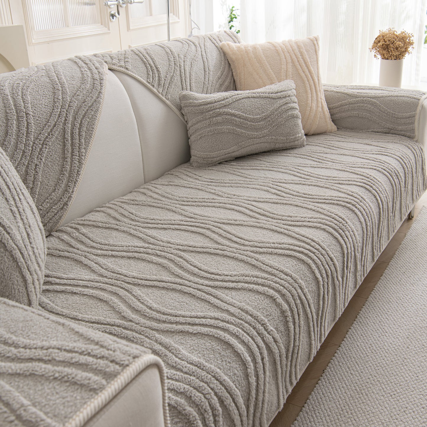 Winter Thickened Non-slip Blanket, Three-Dimensional Embossed Cotton Velvet Sofa Cover on a cozy couch in a bright room.