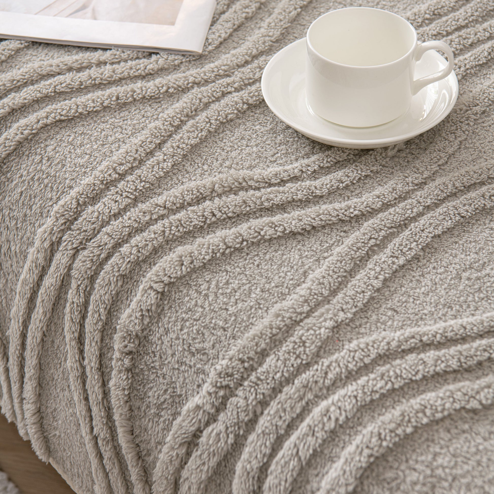 Winter Thickened Non-slip Blanket, Three-Dimensional Embossed Cotton Velvet Sofa Cover, featuring cozy texture and elegant design.