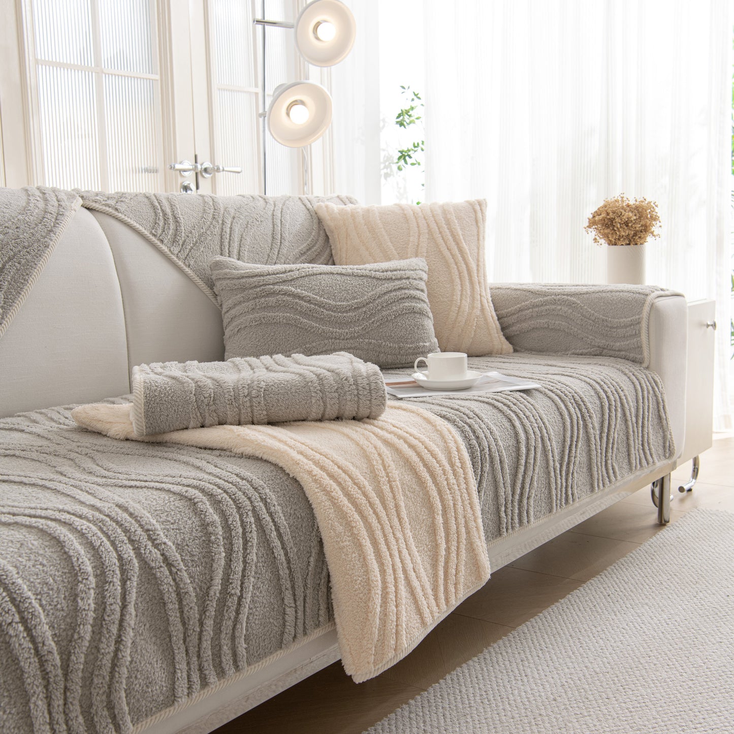 Winter Thickened Non-slip Blanket, Three-Dimensional Embossed Cotton Velvet Sofa Cover on a stylish modern sofa.