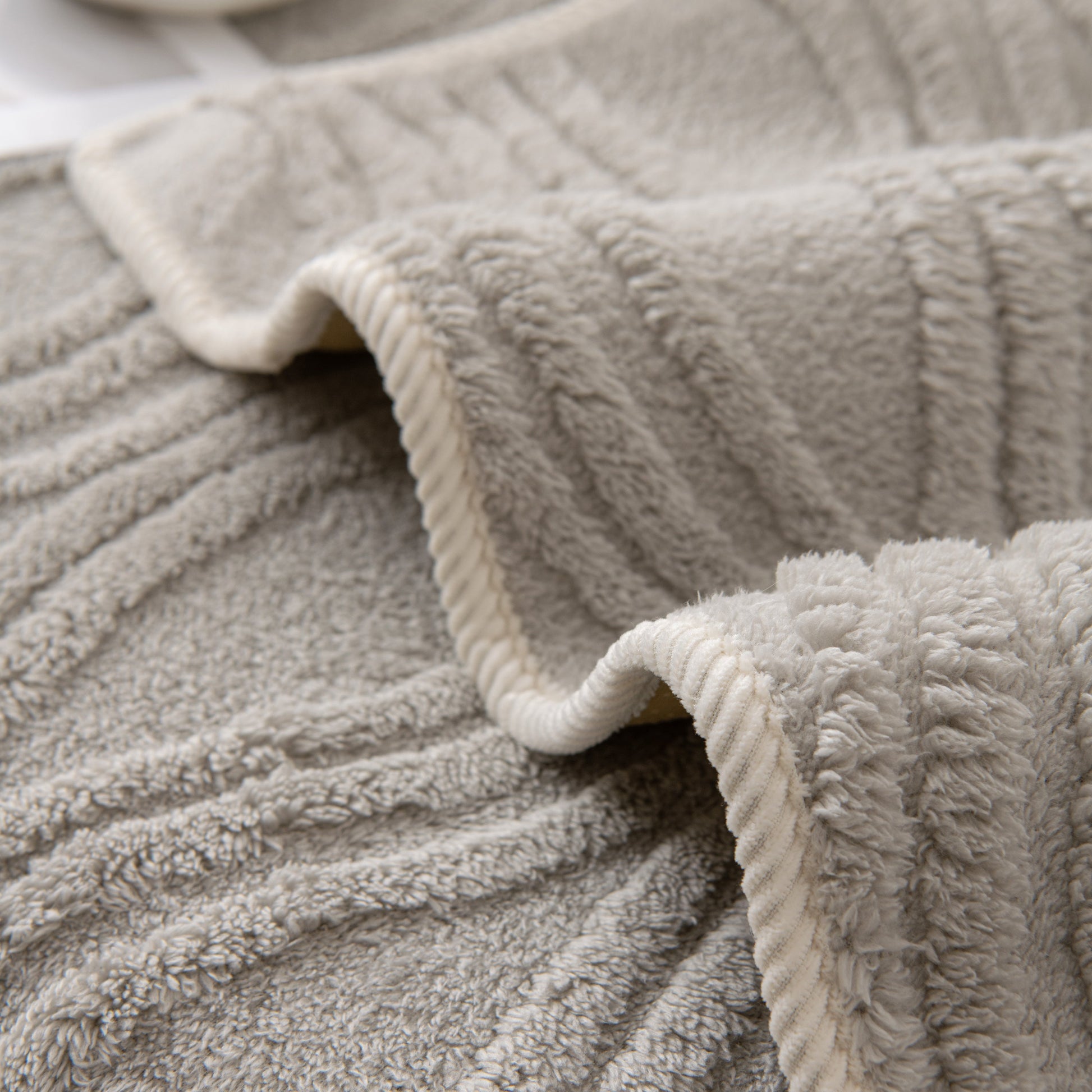 Winter Thickened Non-slip Blanket, Three-Dimensional Embossed Cotton Velvet Sofa Cover with luxurious texture.