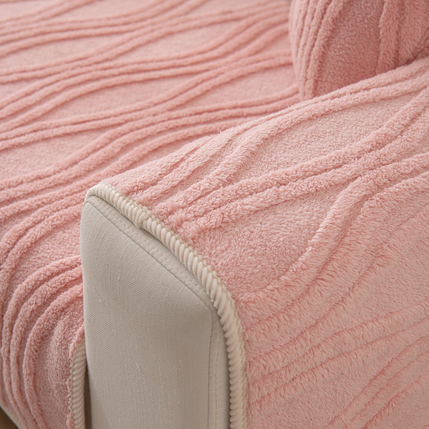 Winter Thickened Non-slip Blanket, Three-Dimensional Embossed Cotton Velvet Sofa Cover in pink, enhancing home decor.