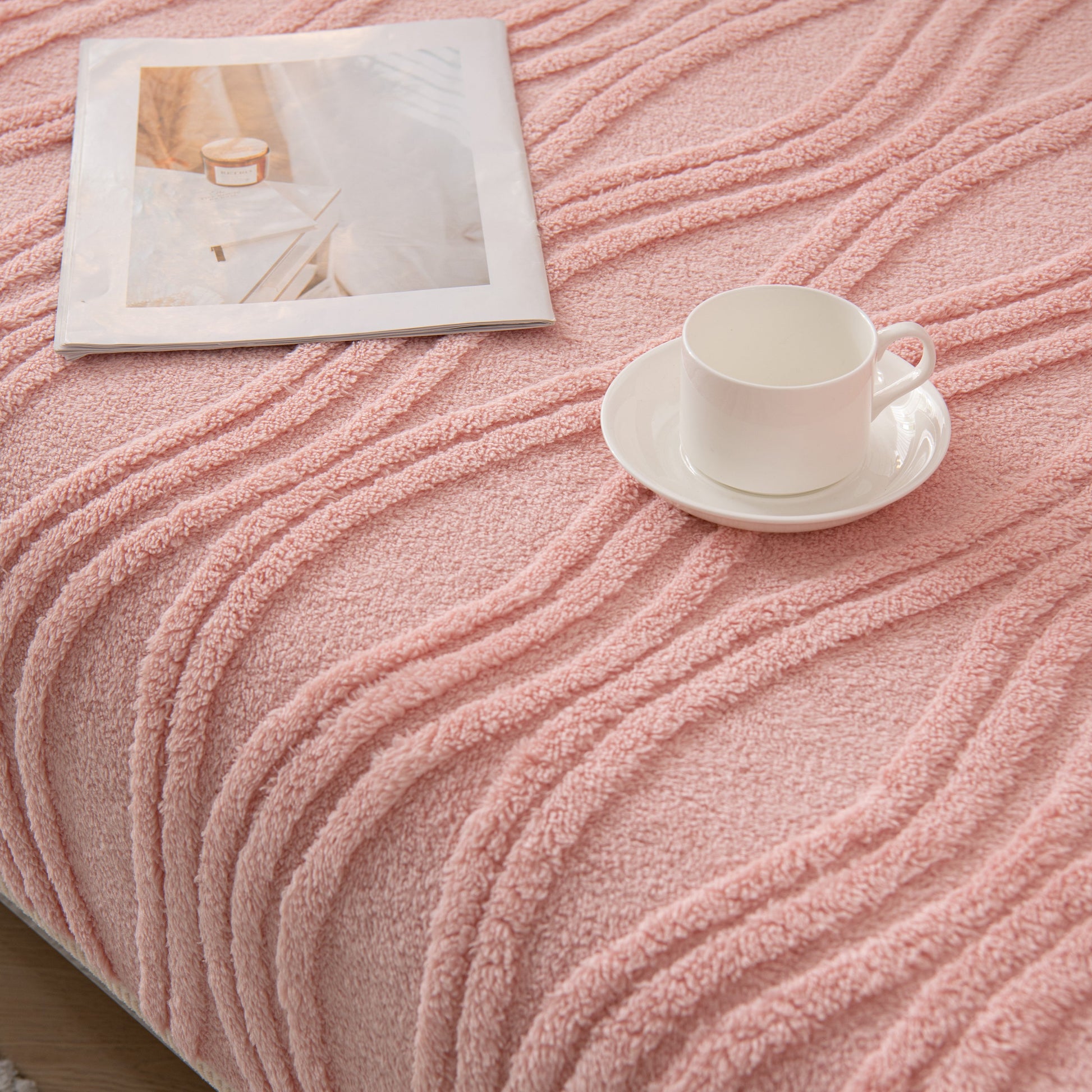 Winter Thickened Non-slip Blanket, Three-Dimensional Embossed Cotton Velvet Sofa Cover with coffee cup and magazine.