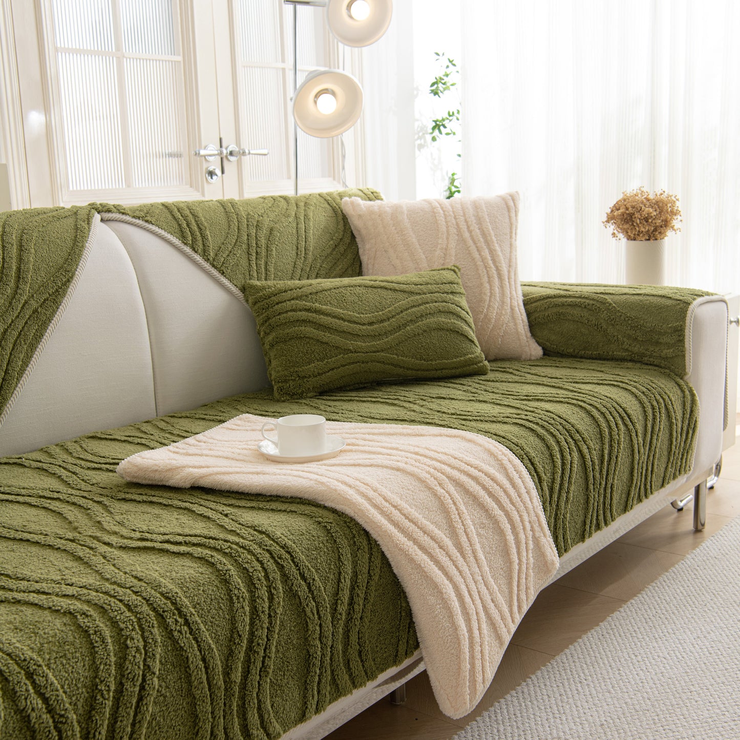 Winter Thickened Non-slip Blanket, Three-Dimensional Embossed Cotton Velvet Sofa Cover draped on a modern couch in a cozy room setting.