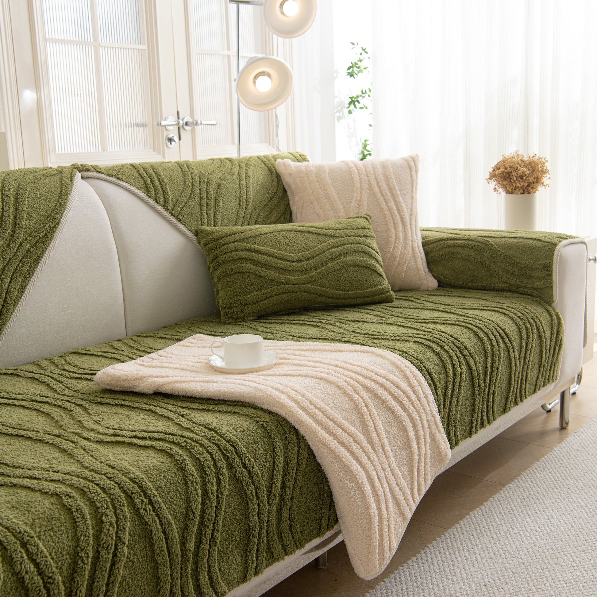 Winter Thickened Non-slip Blanket, Three-Dimensional Embossed Cotton Velvet Sofa Cover draped on a modern couch in a cozy room setting.