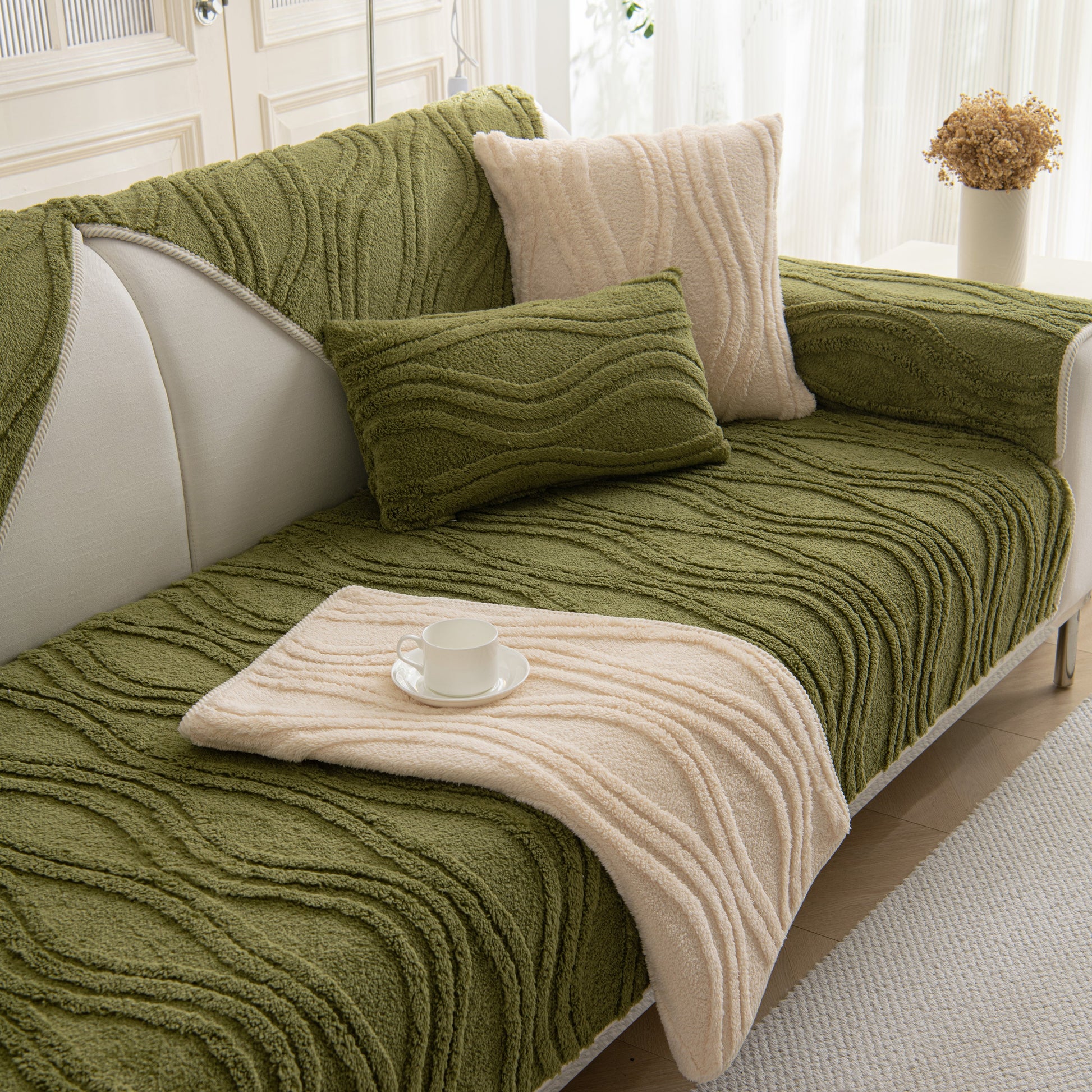 Winter Thickened Non-slip Blanket, Three-Dimensional Embossed Cotton Velvet Sofa Cover on a green sofa with pillows