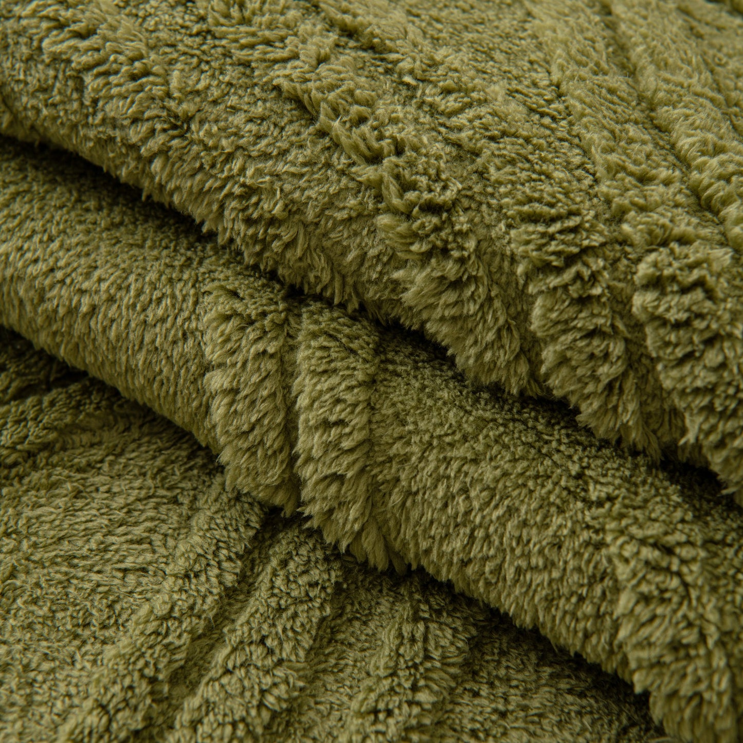 Winter Thickened Non-slip Blanket, Three-Dimensional Embossed Cotton Velvet Sofa Cover in green, close-up texture view.