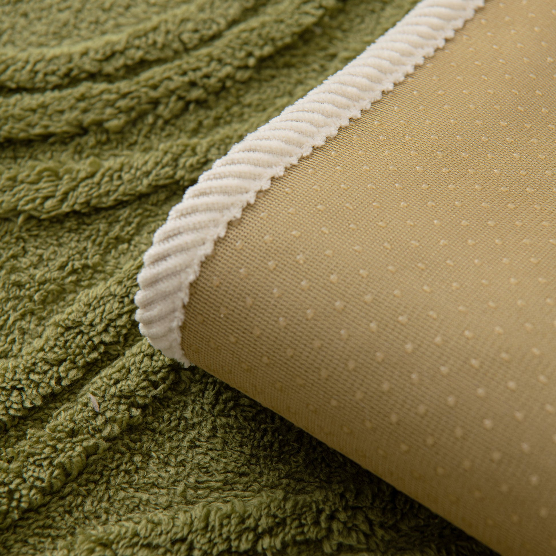 Winter Thickened Non-slip Blanket, Three-Dimensional Embossed Cotton Velvet Sofa Cover in green and beige detail.