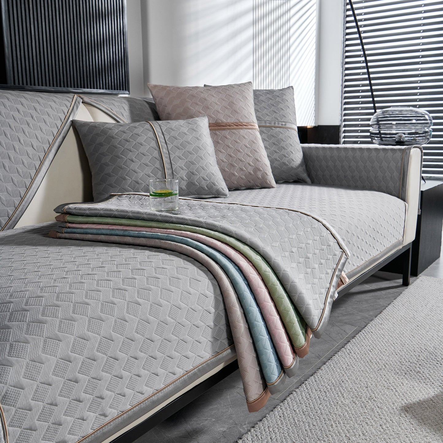 Geometric 3D Sofa Cover, Non-Slip Couch Protector for Seat, Backrest & Armrest with diamond jacquard texture on a modern sofa.