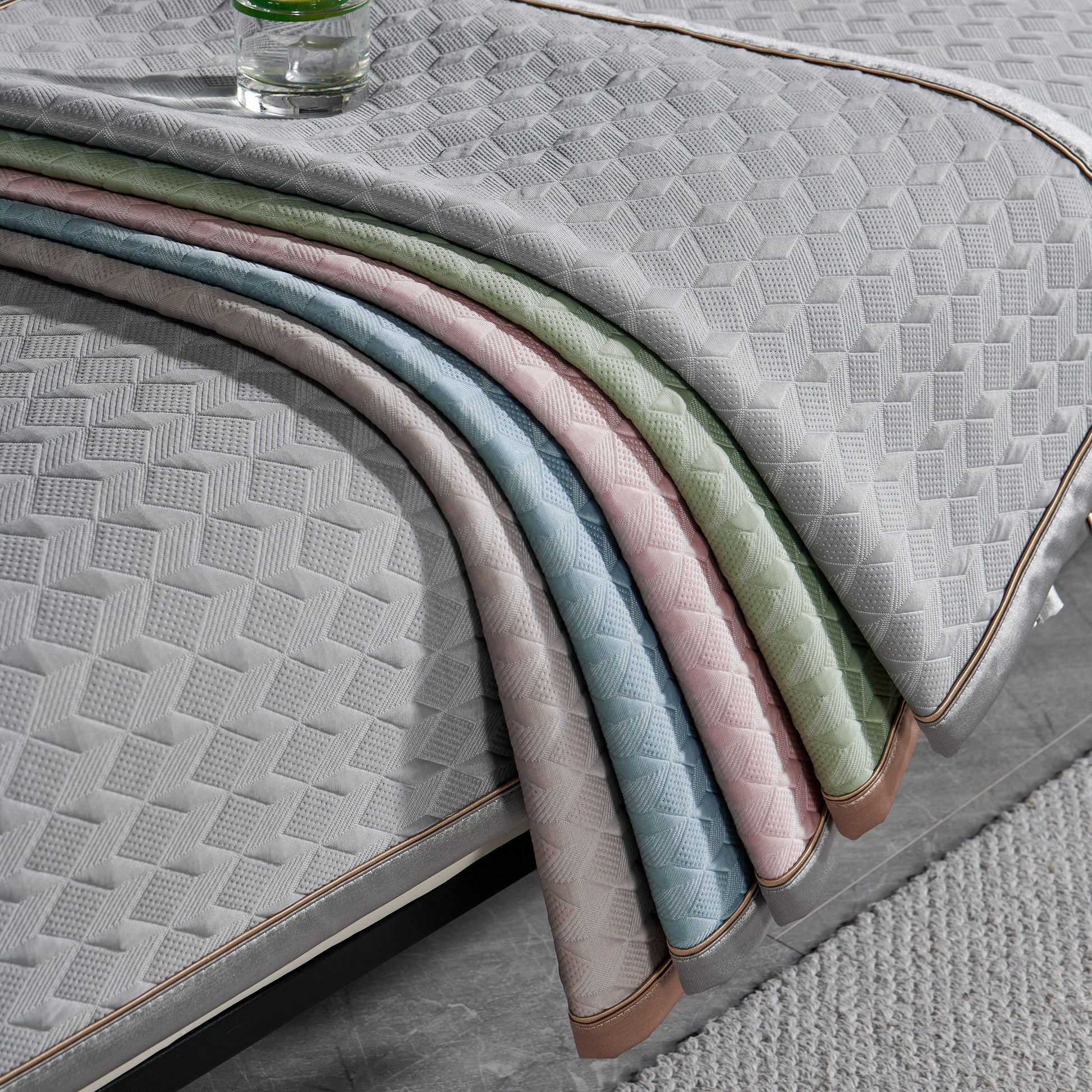 Geometric 3D Sofa Cover, Non-Slip Couch Protector for Seat, Backrest & Armrest with diamond quilted pattern in multiple colors.