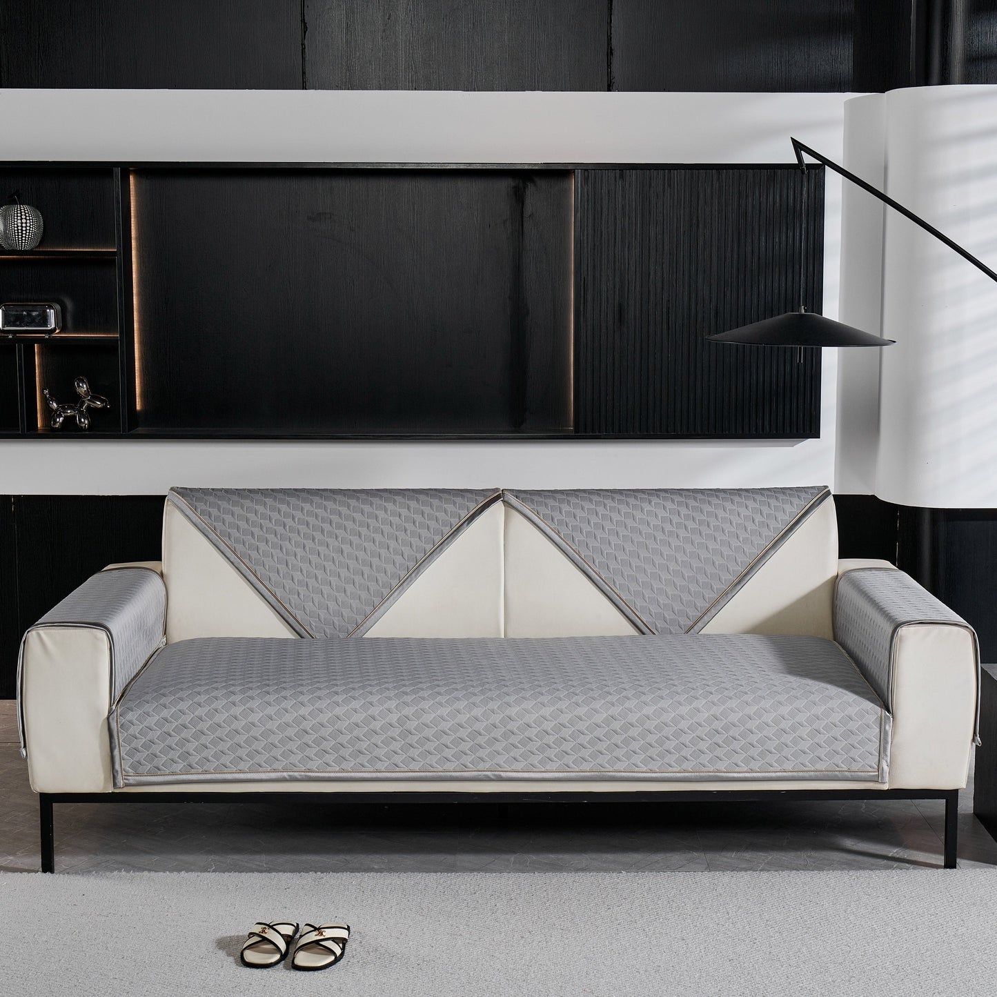 Elegant living room setup featuring a Geometric 3D Sofa Cover, Non-Slip Couch Protector for Seat, Backrest & Armrest with diamond pattern.