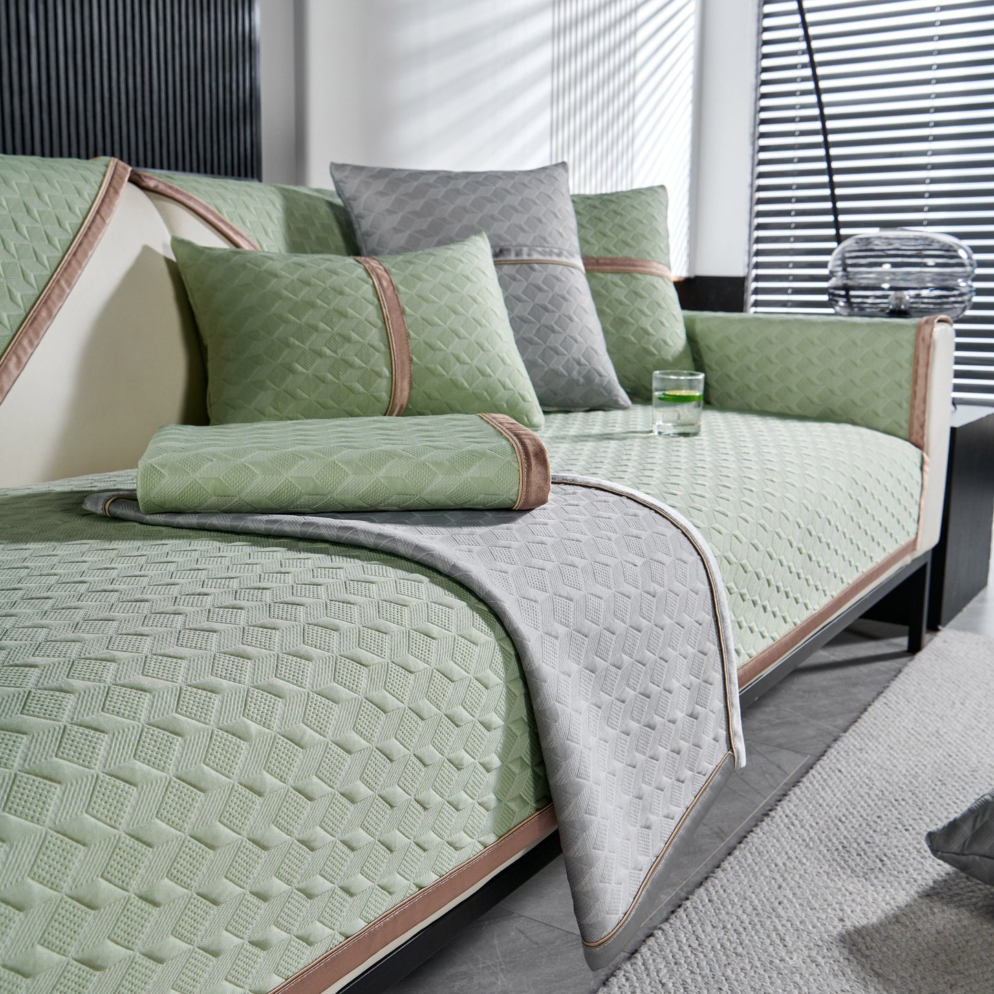 Geometric 3D Sofa Cover, Non-Slip Couch Protector for Seat, Backrest & Armrest in green and grey with diamond quilted design.
