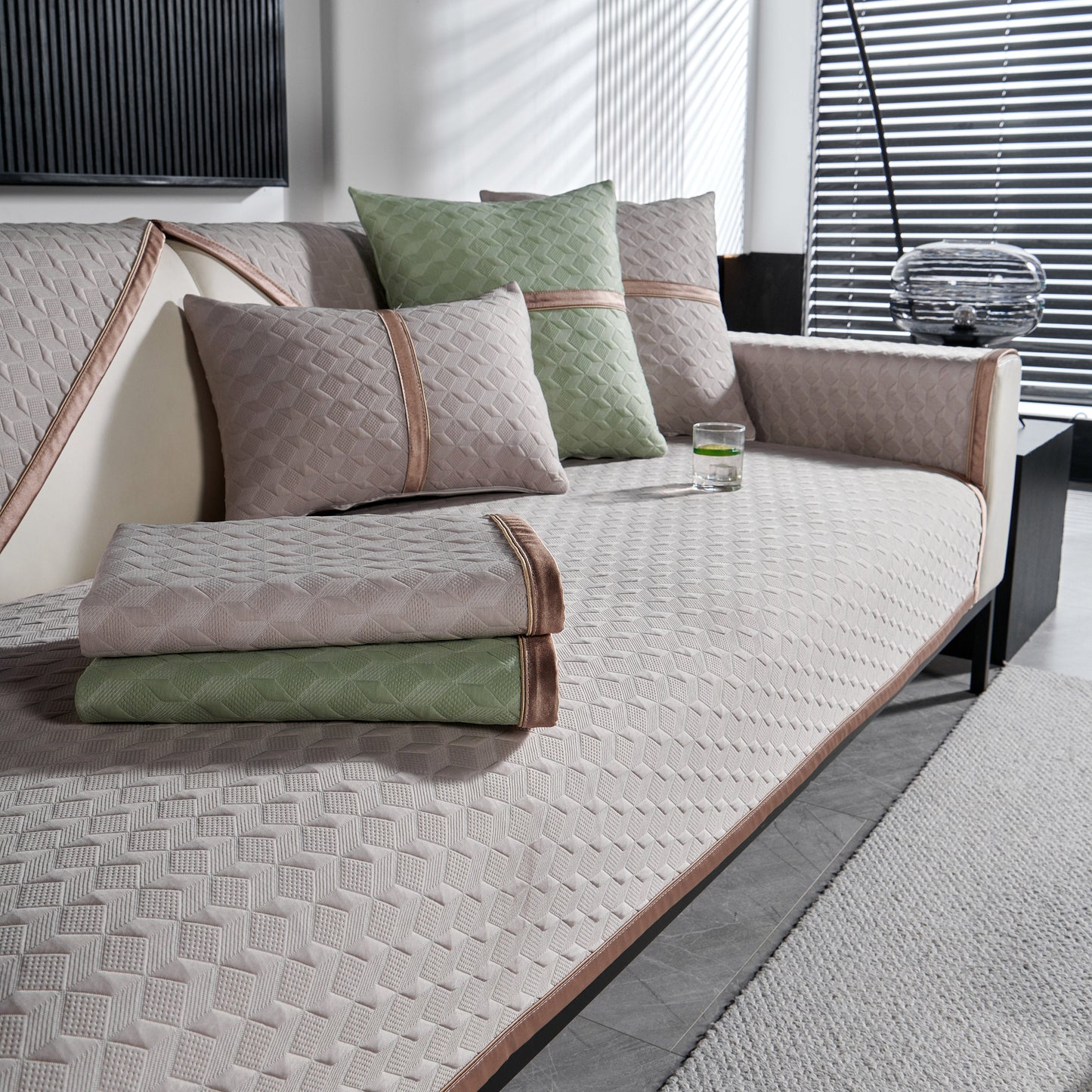 Geometric 3D Sofa Cover, Non-Slip Couch Protector for Seat, Backrest & Armrest with diamond quilted design on modern sofa.