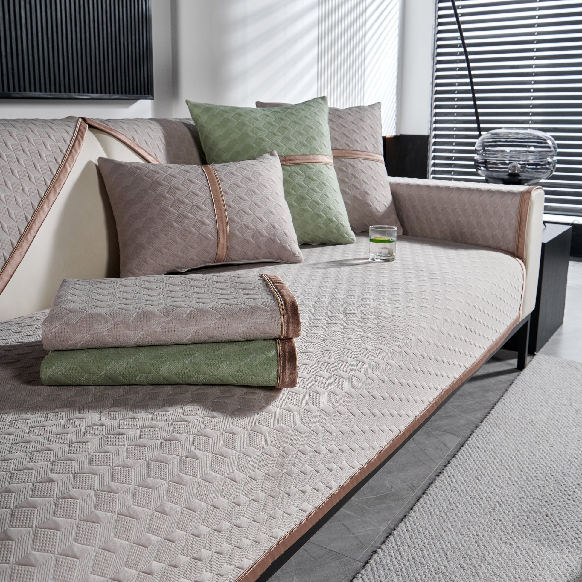Geometric 3D Sofa Cover, Non-Slip Couch Protector for Seat, Backrest & Armrest with diamond quilted design on modern sofa.