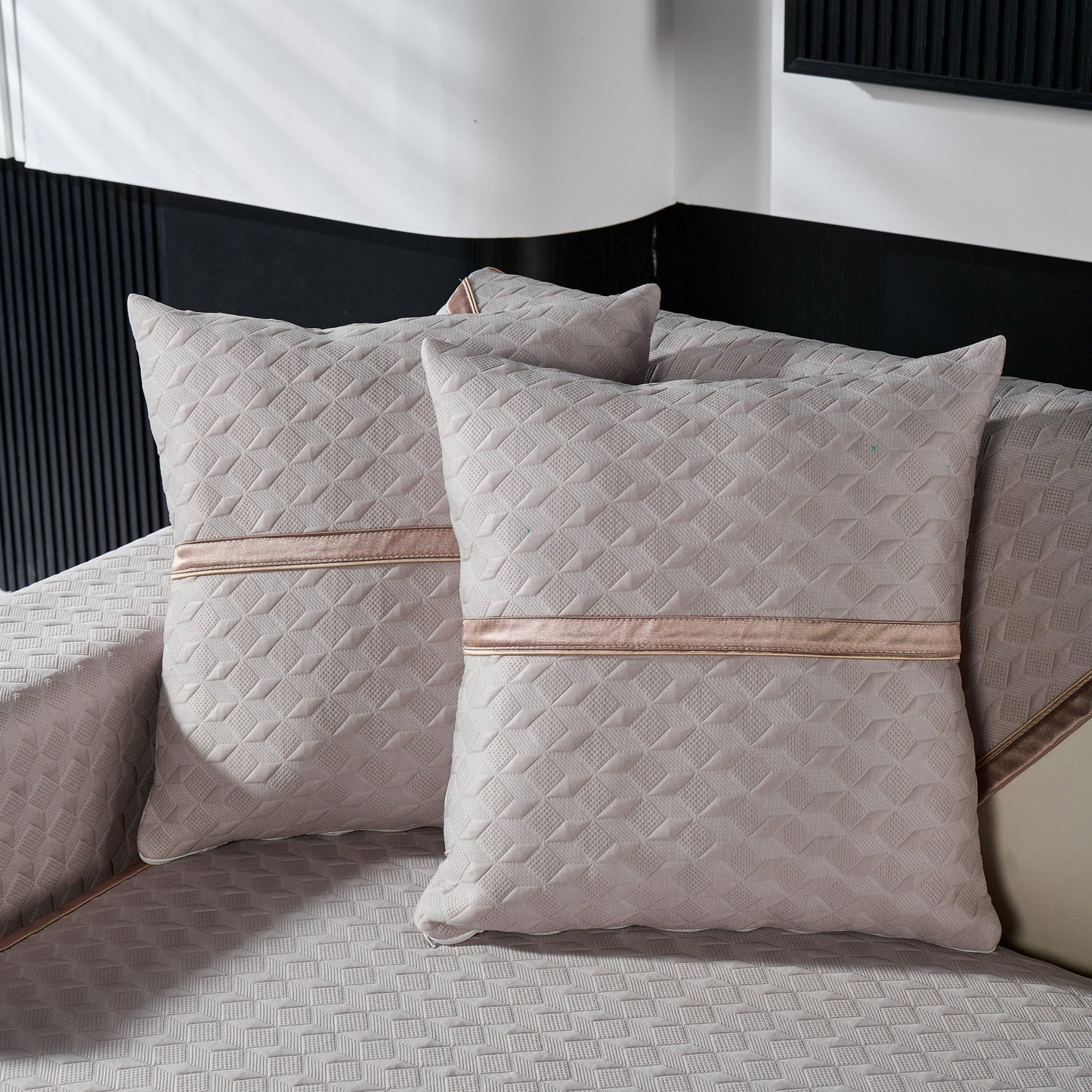 Geometric 3D Sofa Cover, Non-Slip Couch Protector for Seat, Backrest & Armrest with diamond-quilted pillows on beige sofa